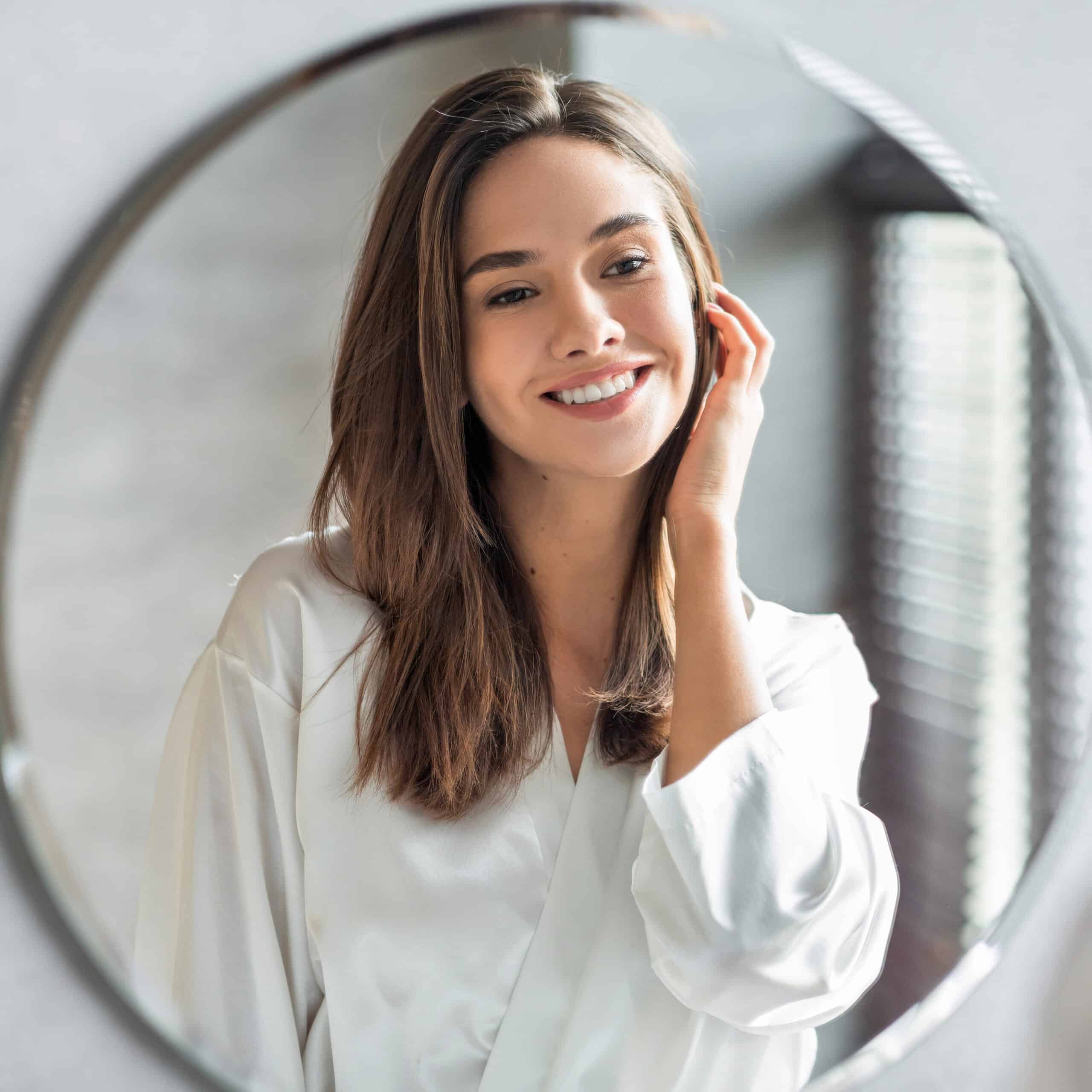 Woman looking at her reflection